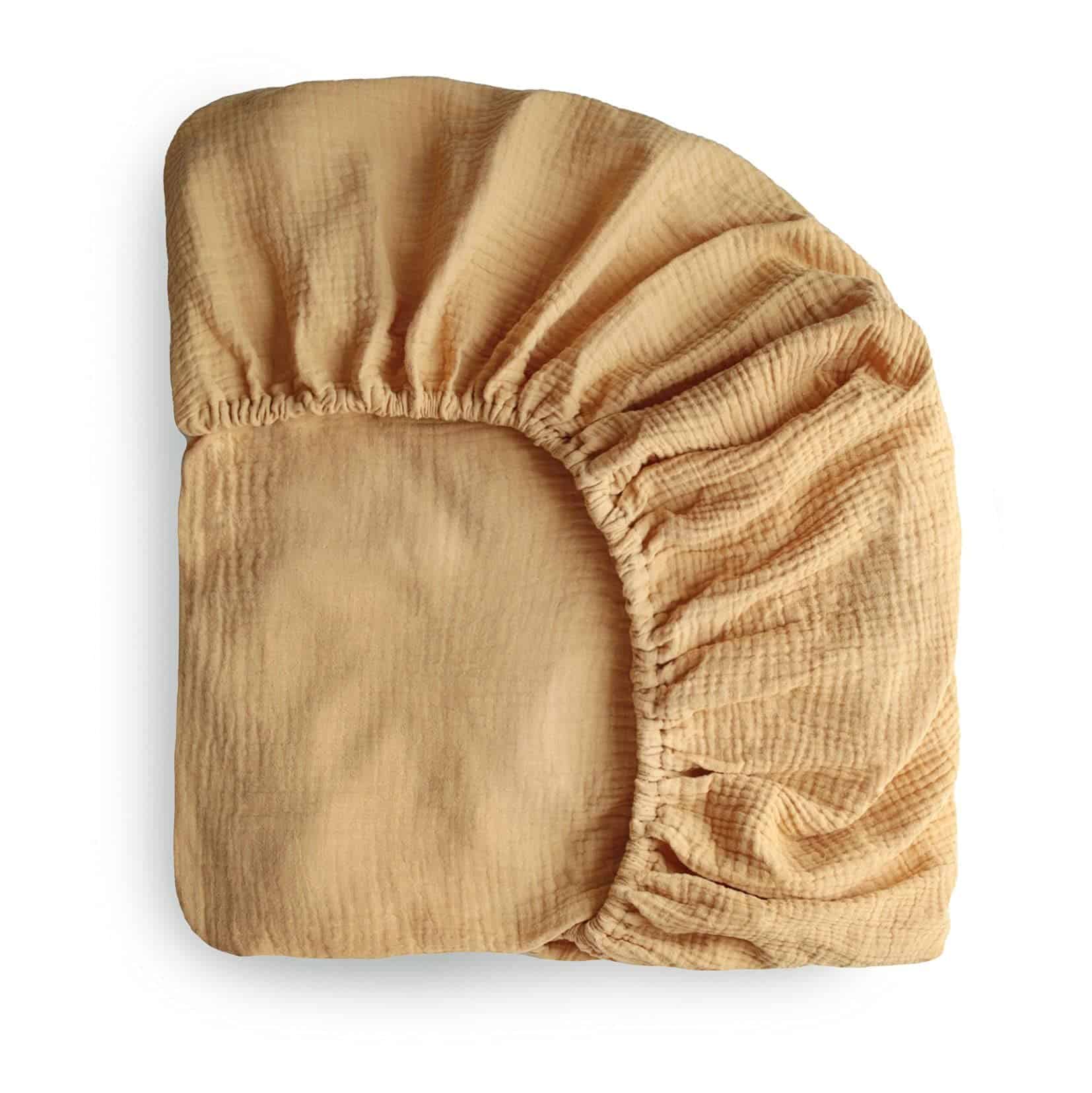 Sábana de Cuna Ajustable mushie Extra Suave de Muselina |